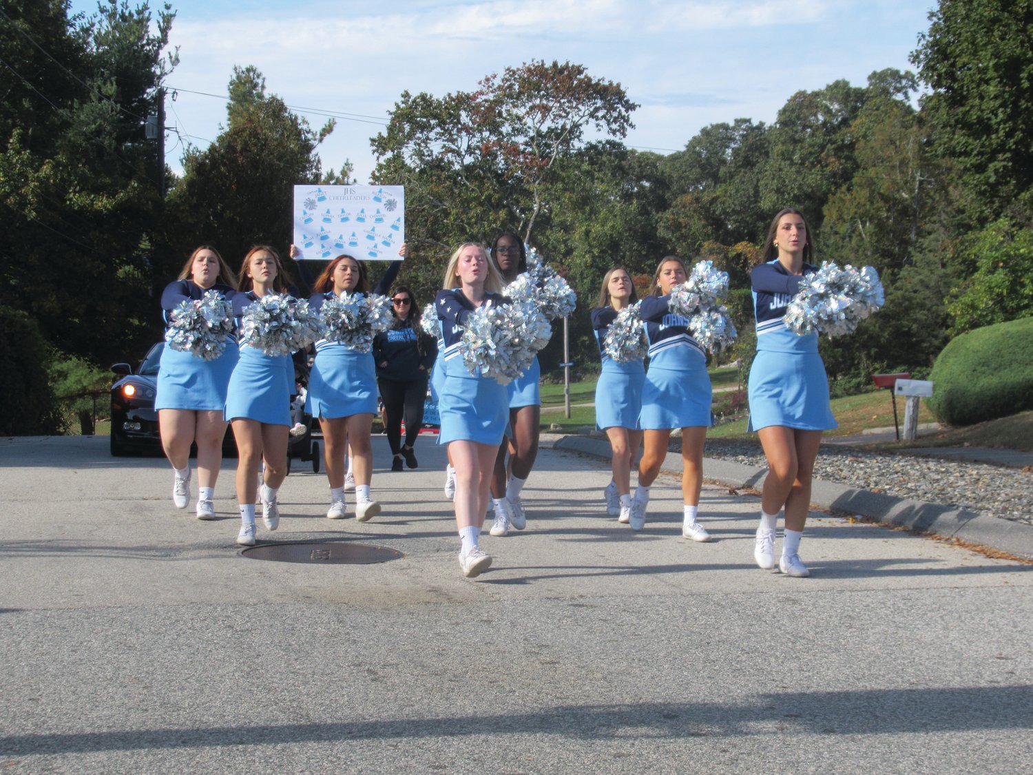 Johnston High School’s 2021 Homecoming will long be remembered as a super showcase of community spirit at an all-time high. The high school's cheerleading squad marched in the parade.